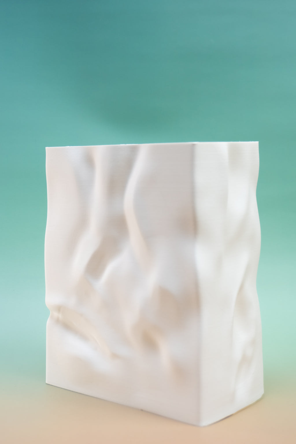 Sculpted paper bag vase